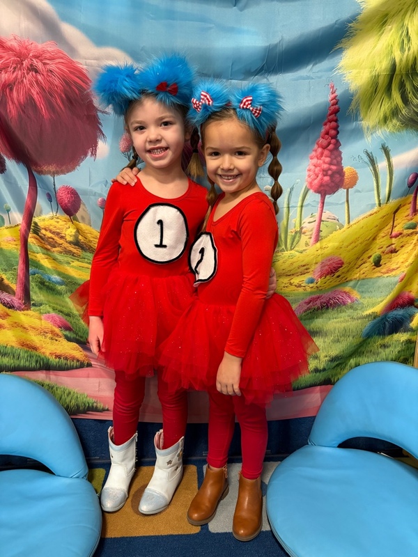 Two girls dressed as Thing 1 and Thing 2 at KPT celebration