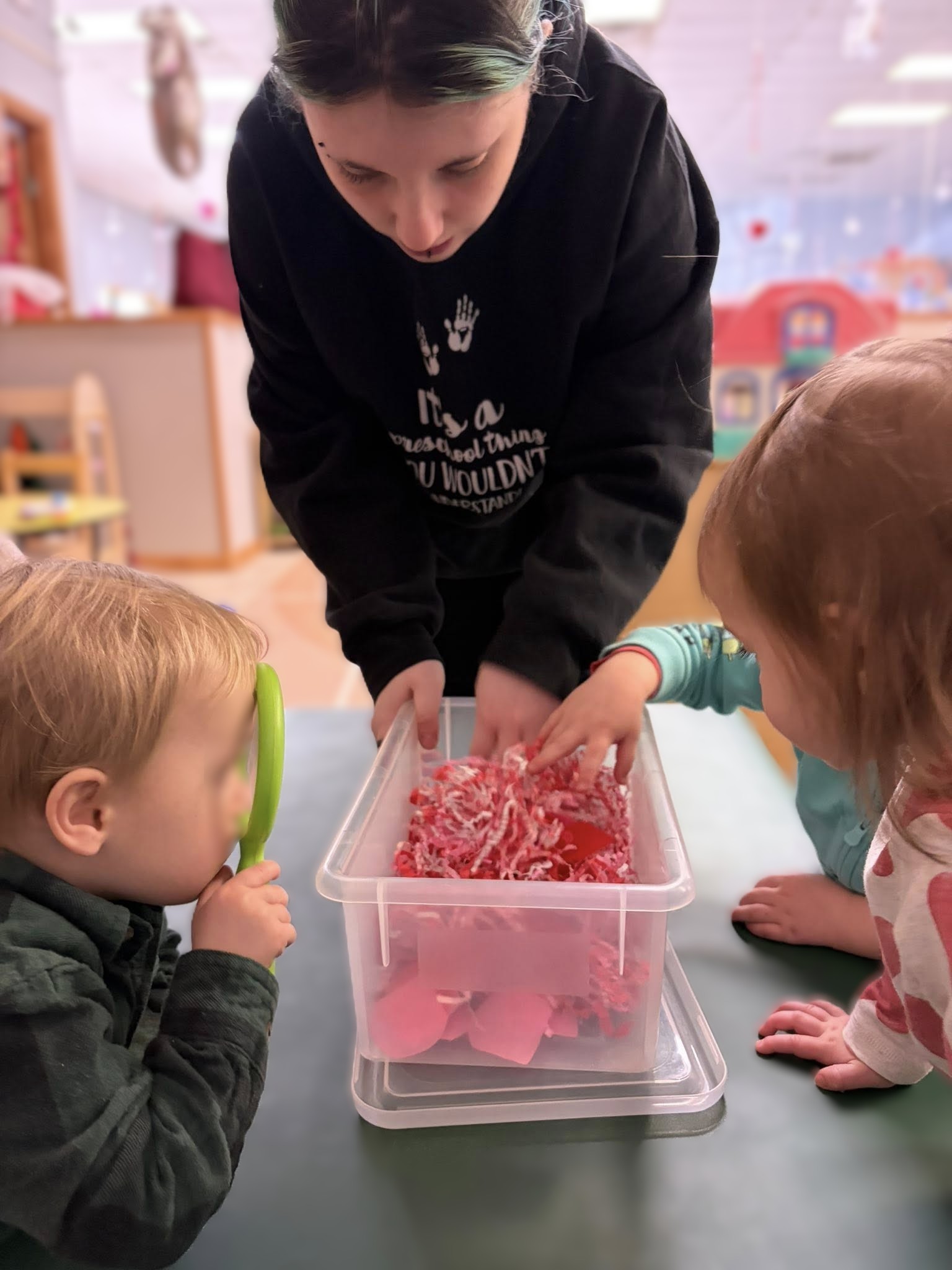 Teacher and 2 children