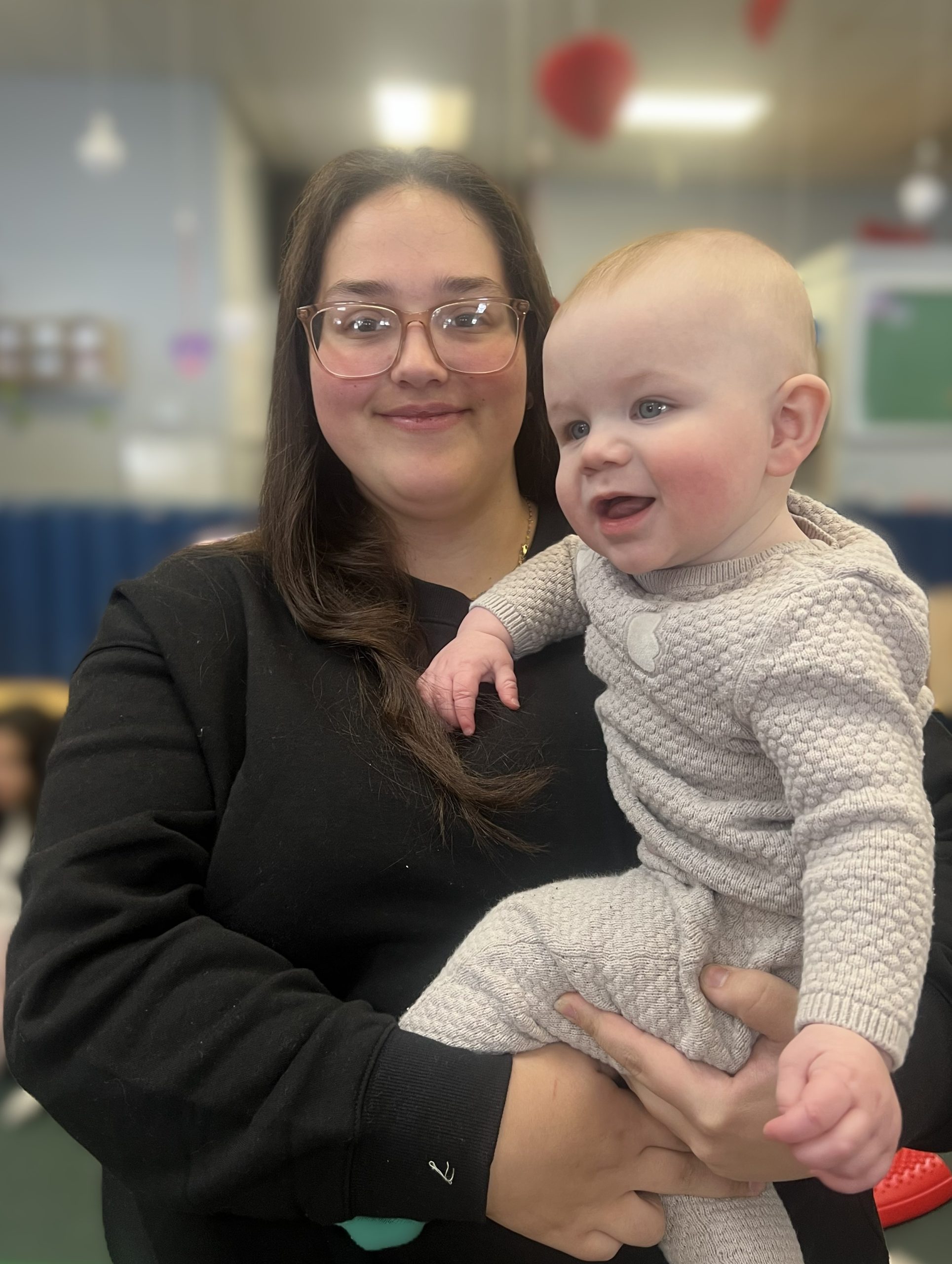 Teacher working with a child in the classroom